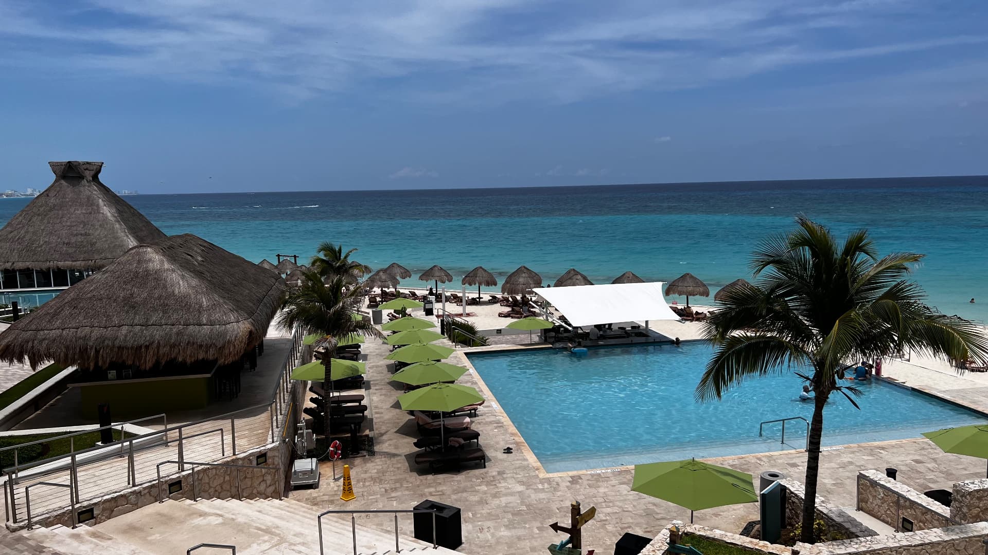 Pools, palms, and the turquoise Caribbean at The Westin Cancún