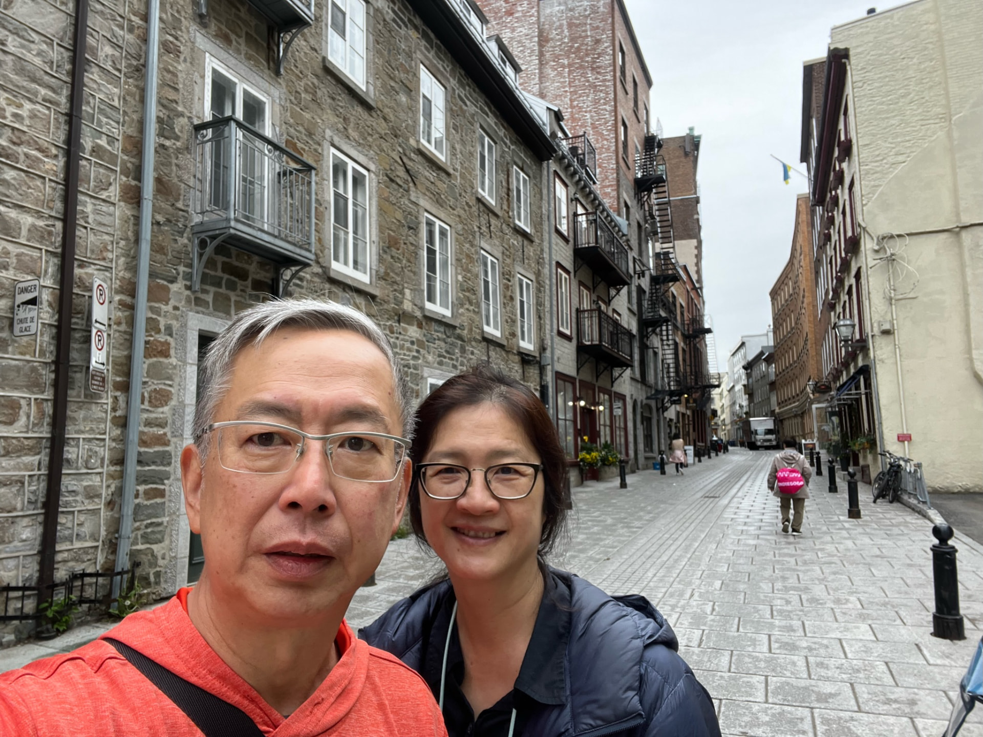 Ken and a family member on a stone-paved street in Québec City