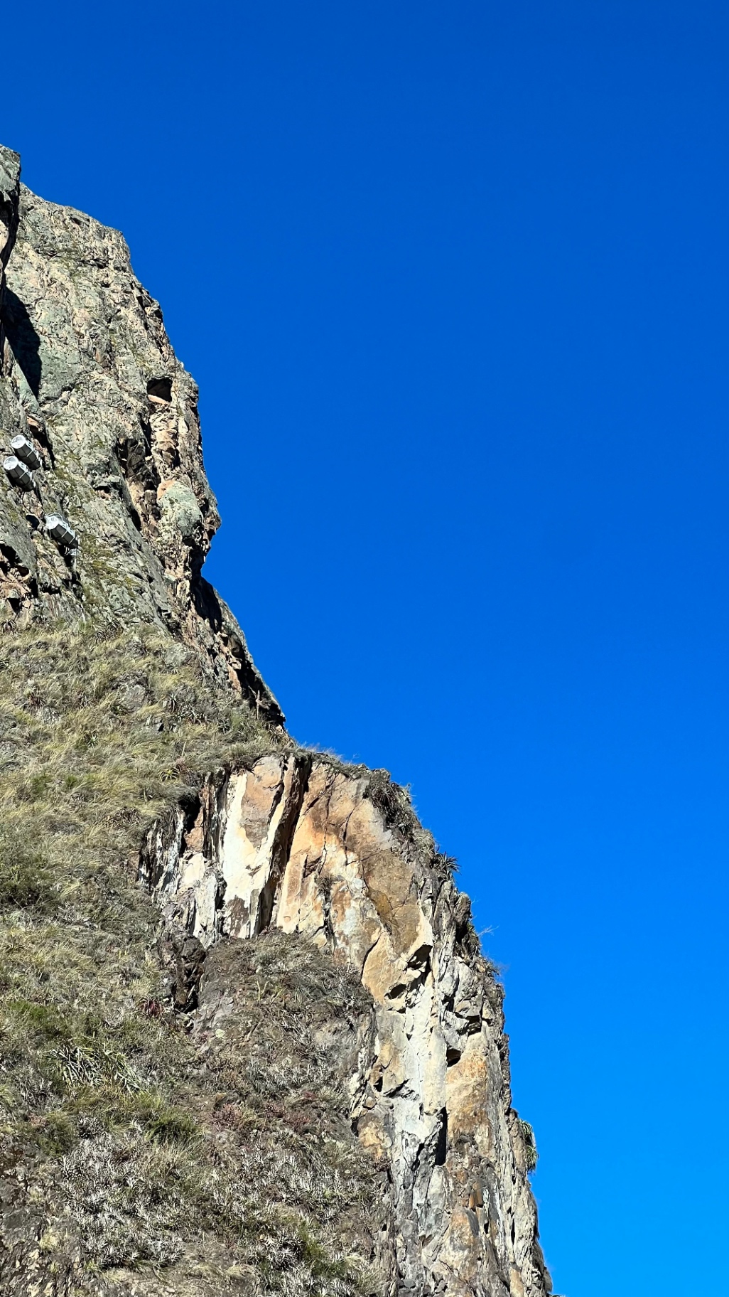 Profile-like rock formation high on an Andean cliff