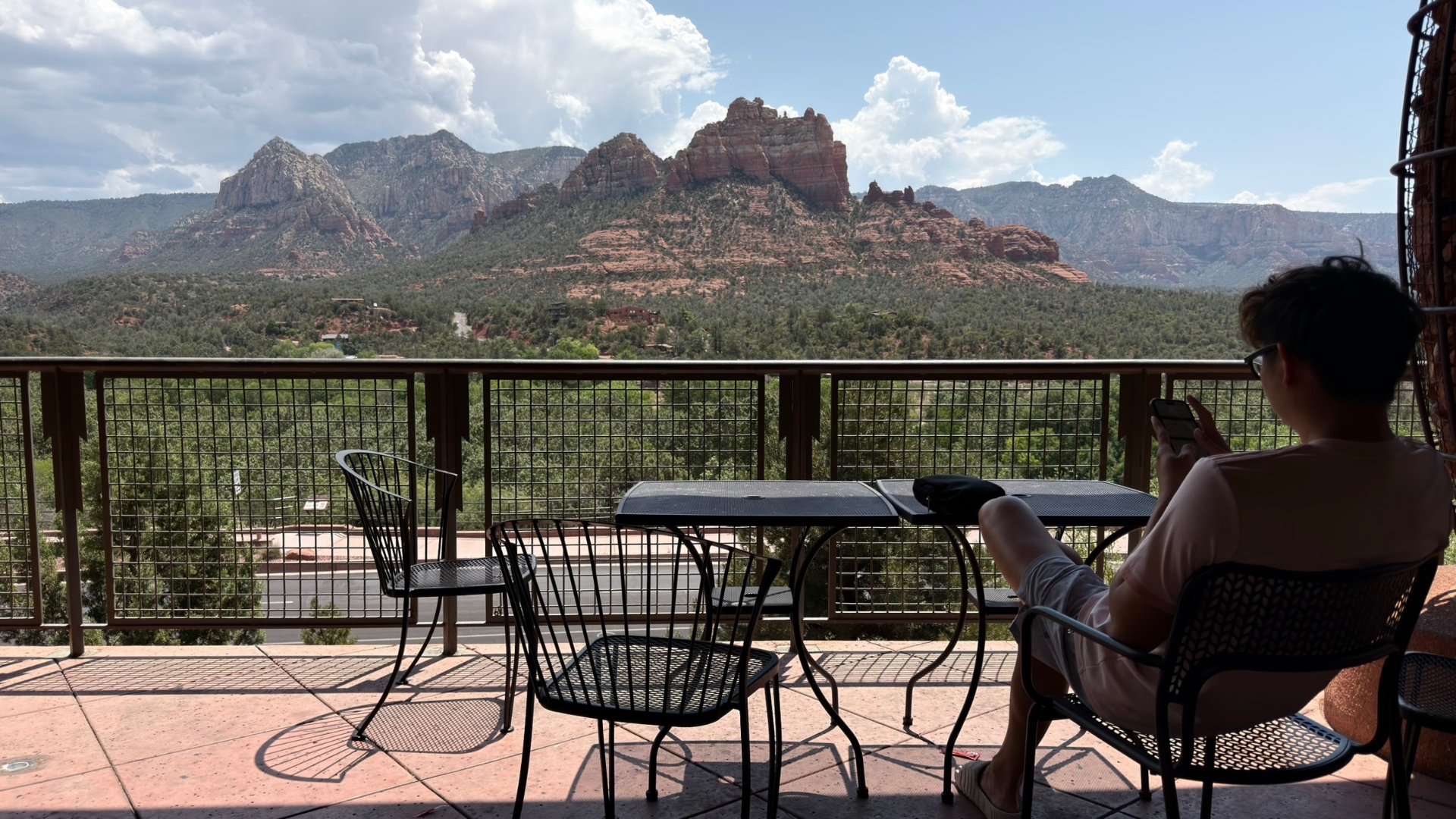 A terrace with tables looking out at Sedona's red rock formations