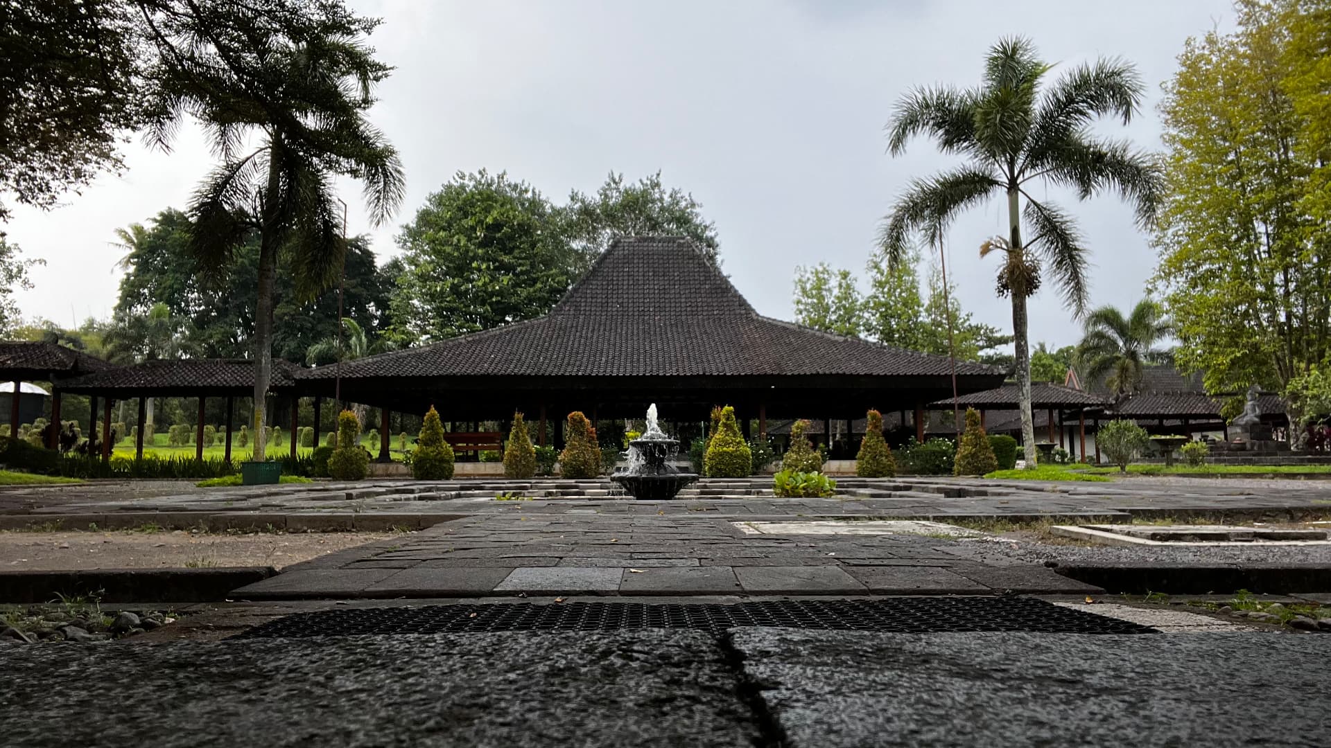 A Javanese pavilion and fountain on the temple grounds