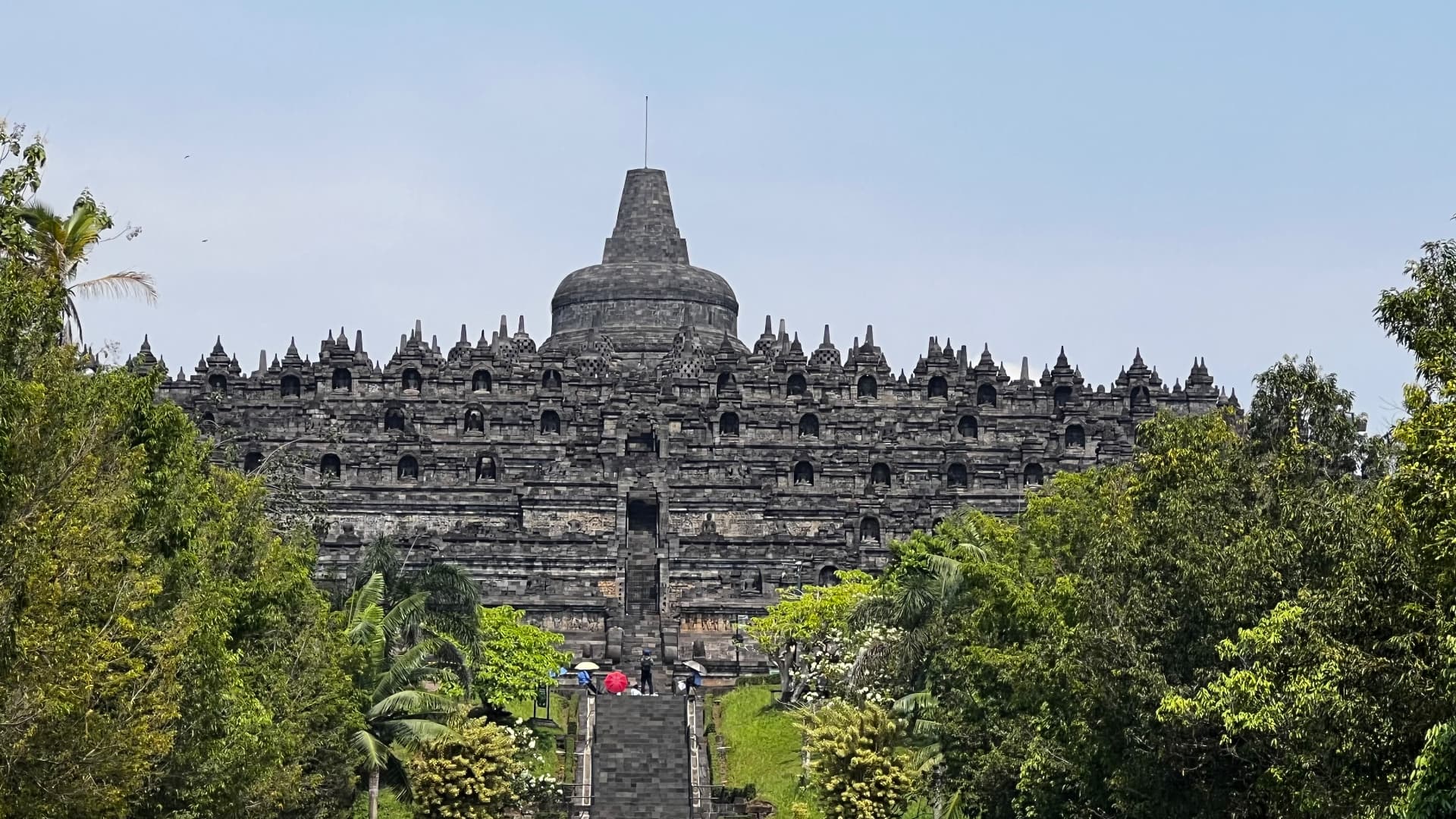 Borobudur's stepped stone terraces seen from the approach