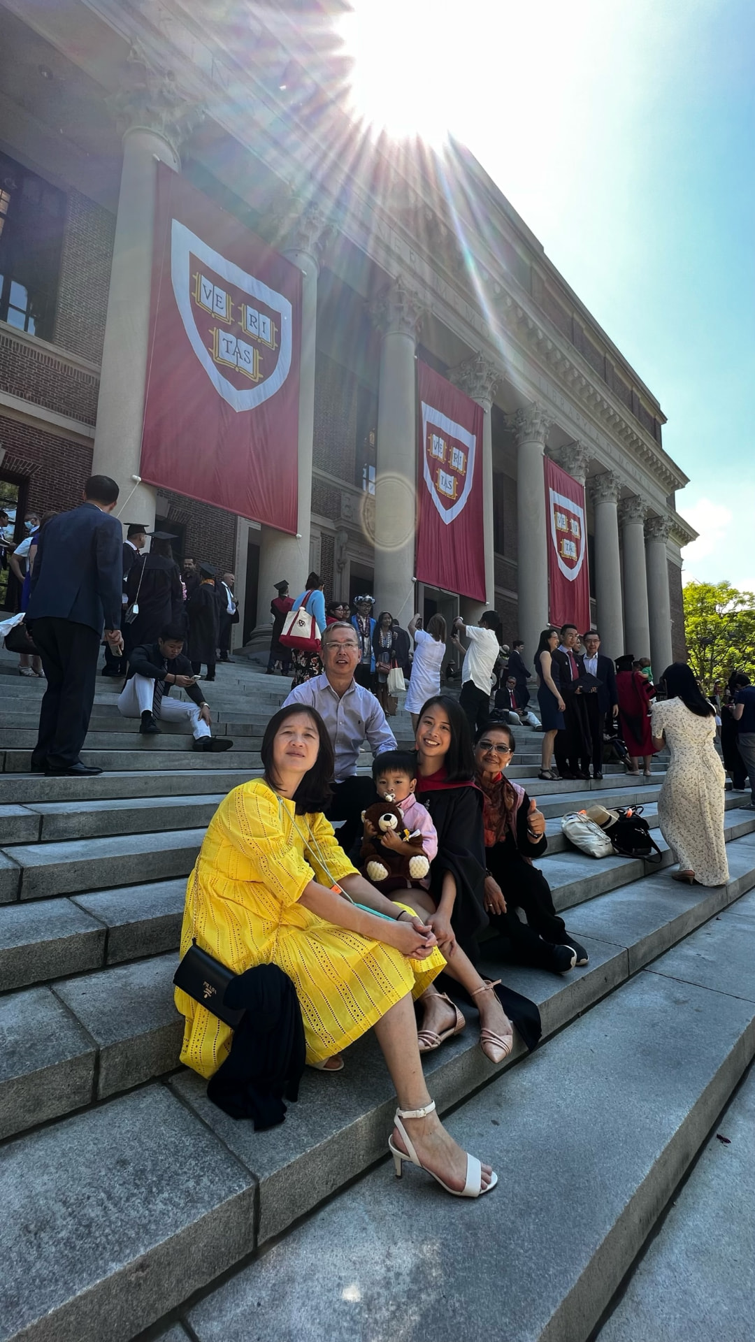 Sitting on the Widener Library steps in the afternoon sun