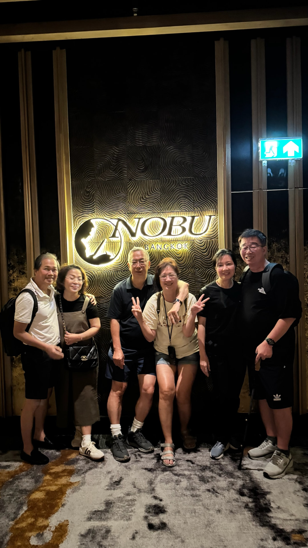 Friends posing together at Nobu Bangkok