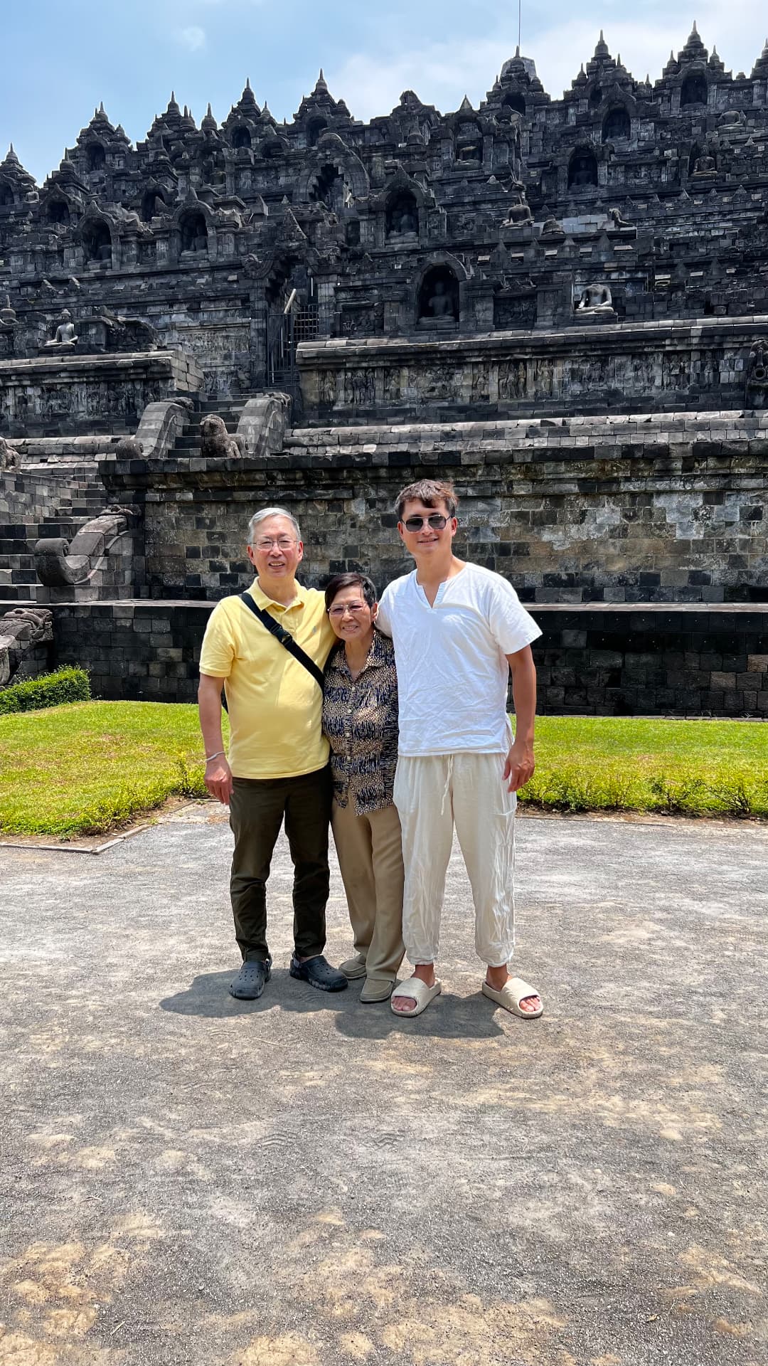 Family portrait in front of Borobudur's stone terraces