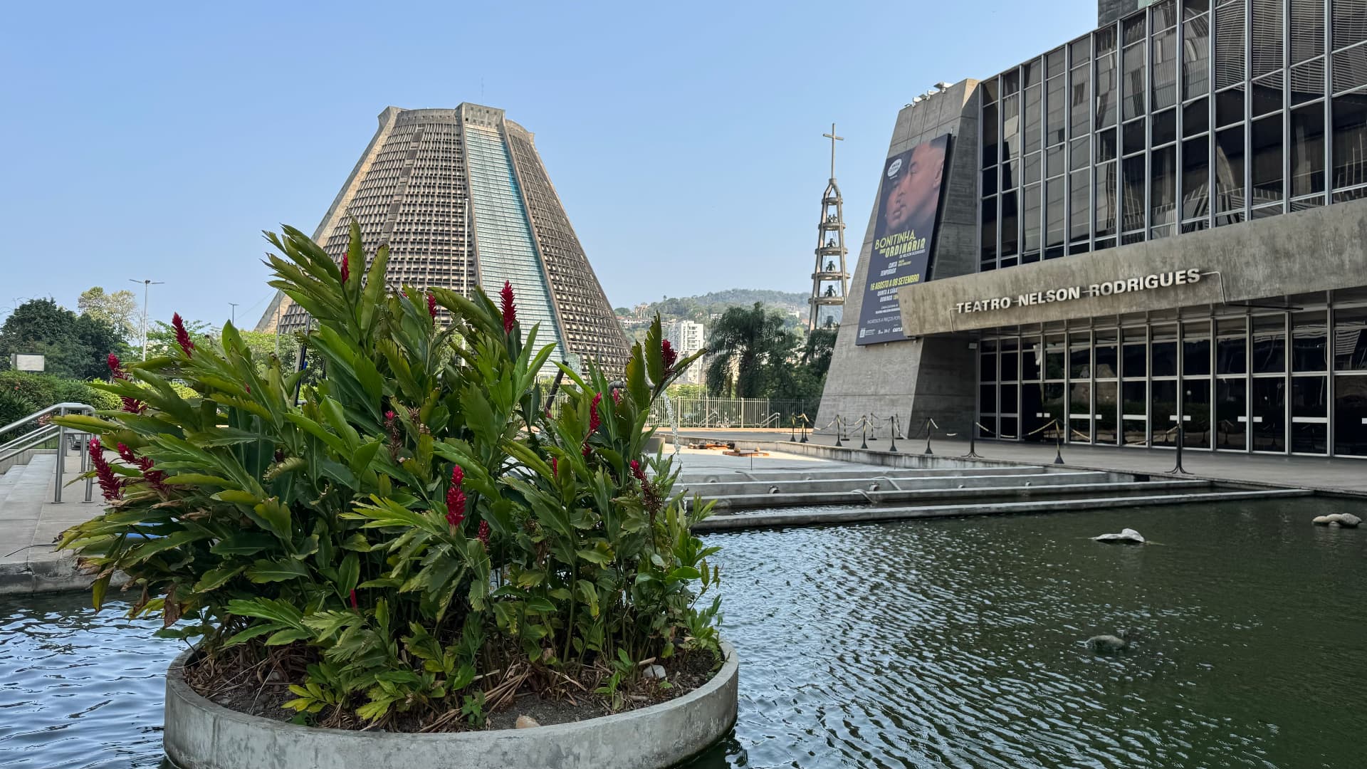 Metropolitan Cathedral of Saint Sebastian beyond tropical planting and a reflecting pool