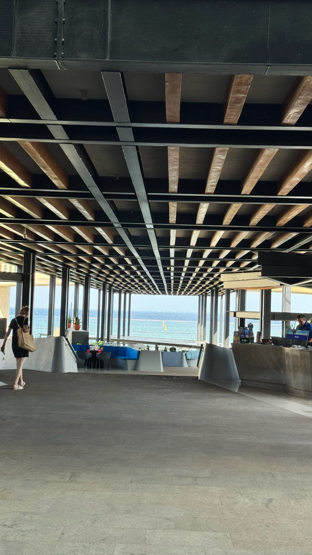 Open resort lobby looking directly toward the Caribbean