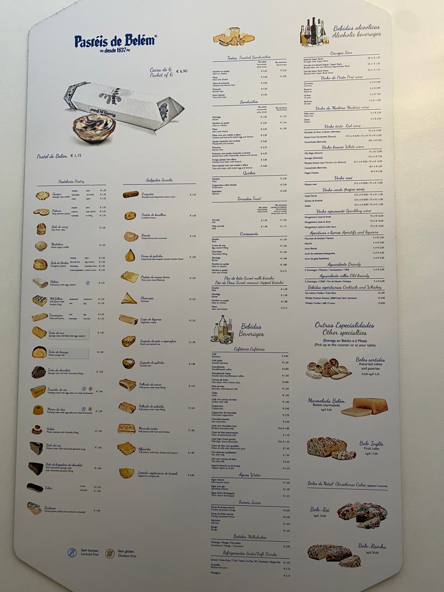 A long paper menu hanging in a Lisbon bakery