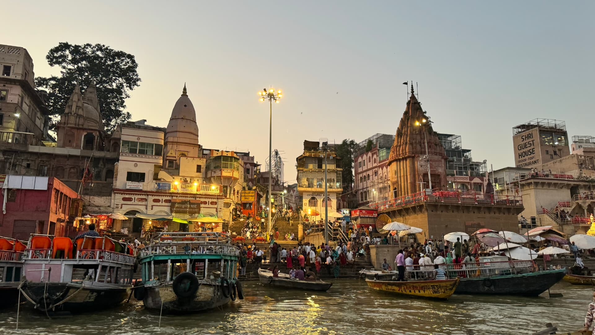 The ghats brighten as daylight gives way to evening. — Varanasi, Uttar Pradesh, India.