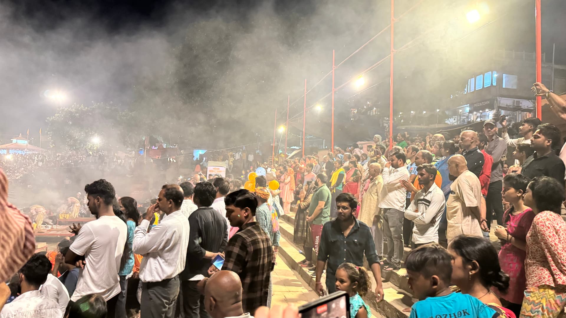 A closer view of the gathering at the evening ceremony. — Varanasi, Uttar Pradesh, India.
