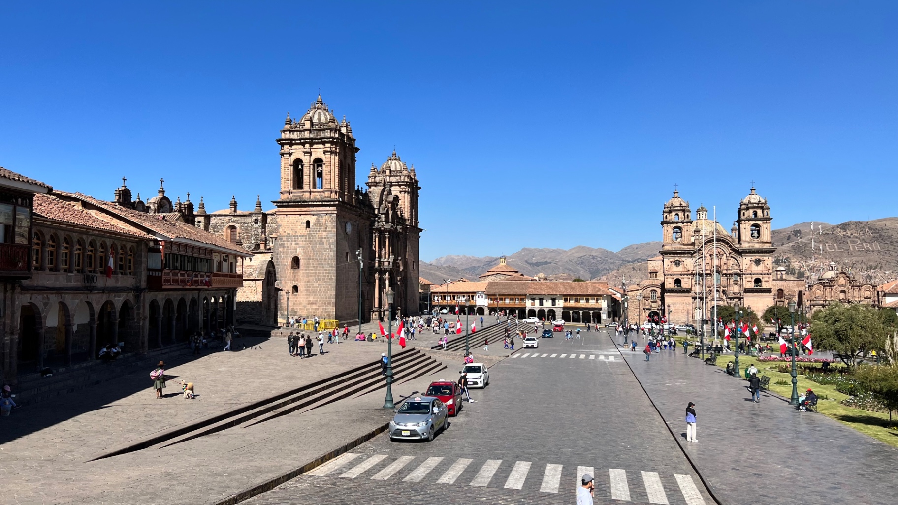 Cusco's Plaza de Armas and cathedral beneath a clear blue sky