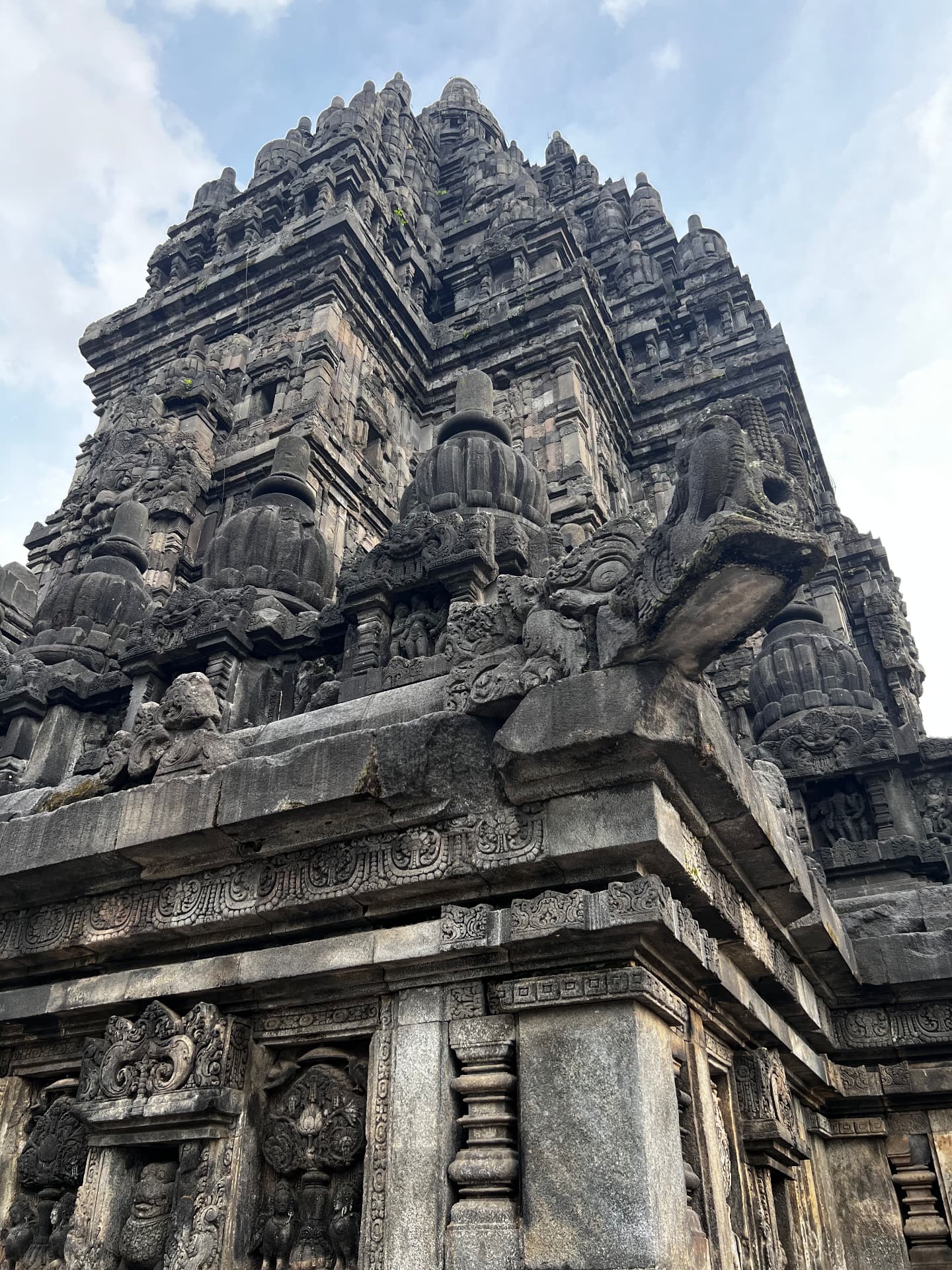 Ornate stone carvings and roof of a Prambanan temple
