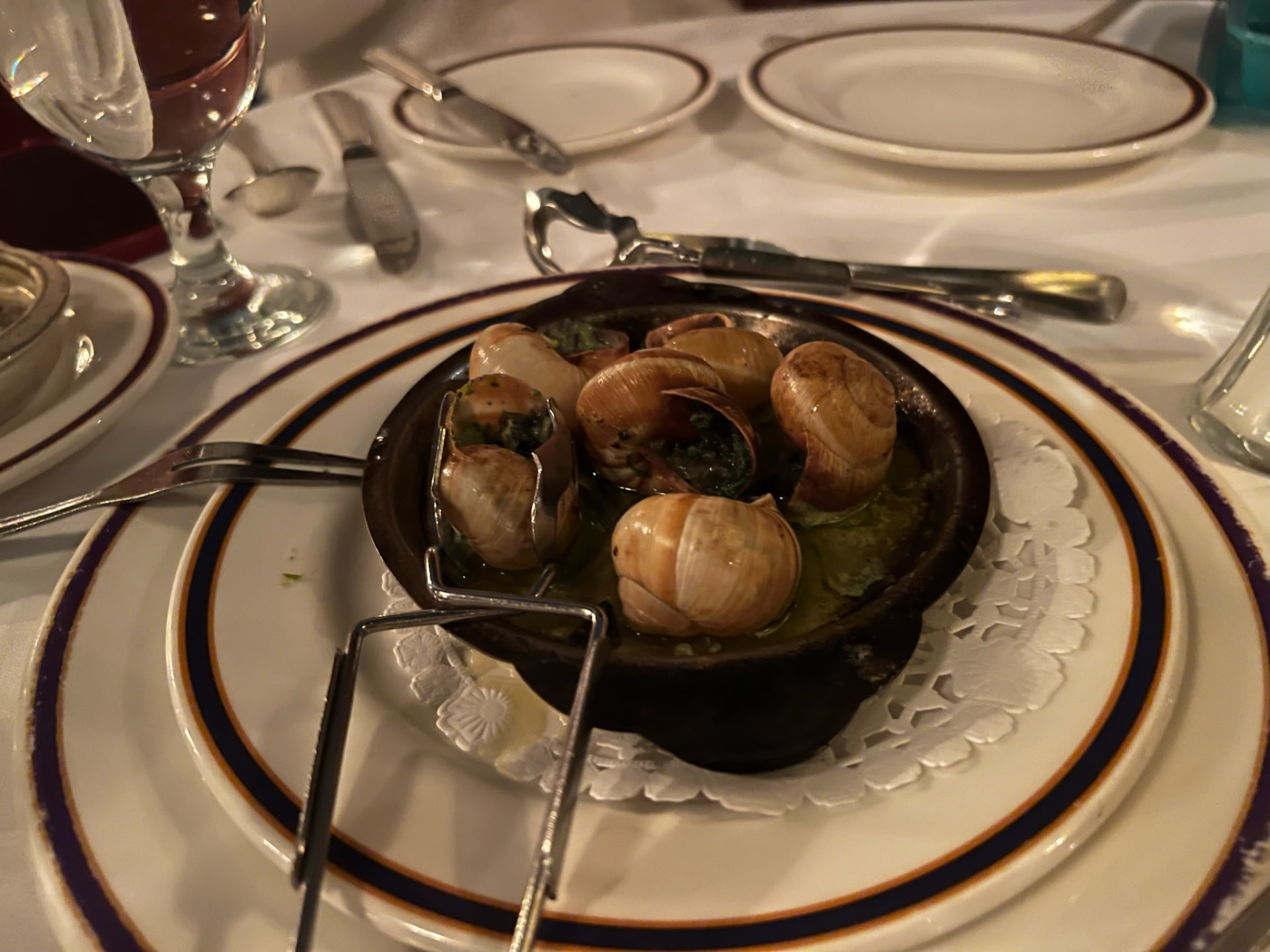 Escargots served in garlic butter