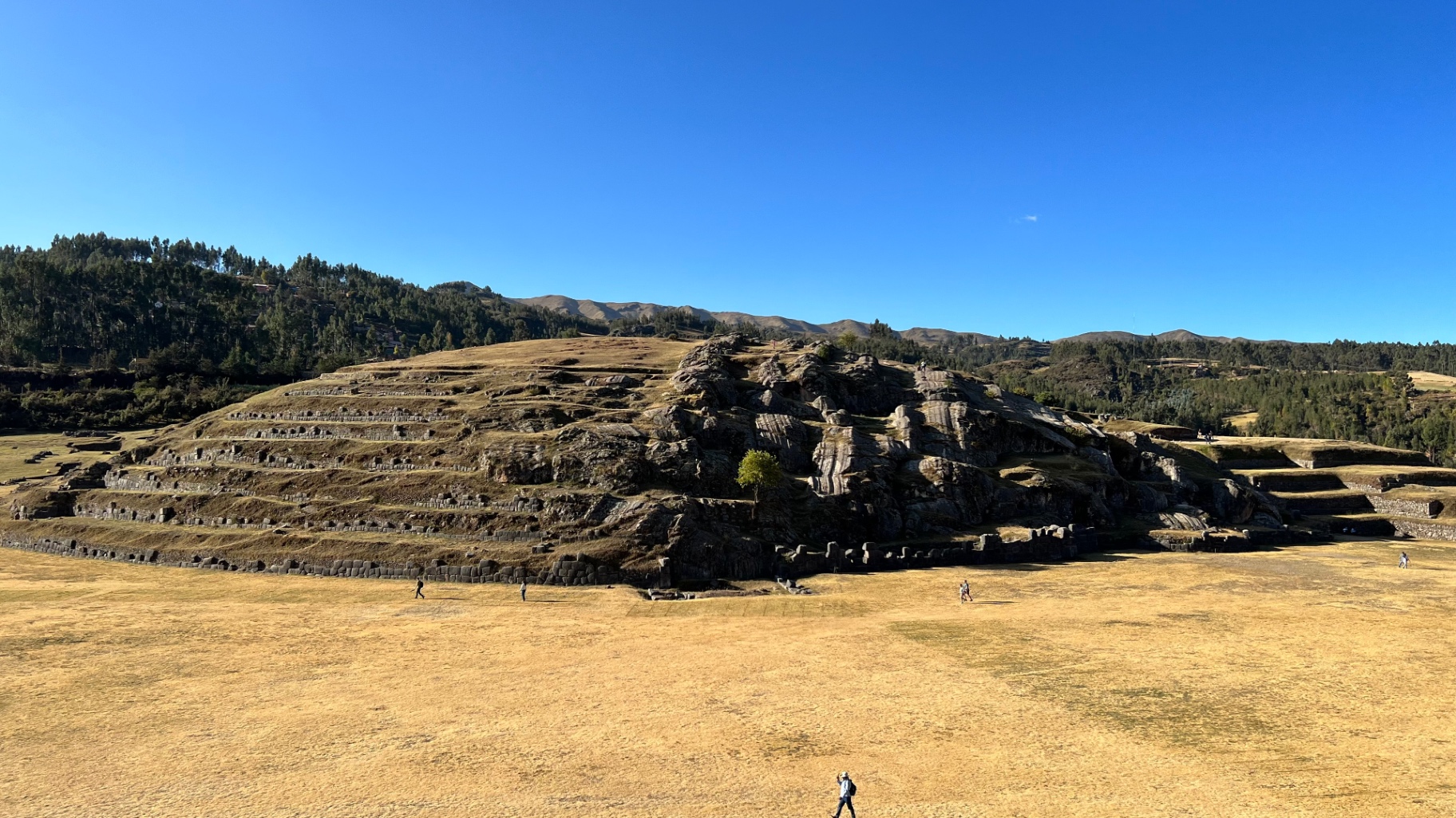 Broad grass terraces and stone ramparts at Sacsayhuamán