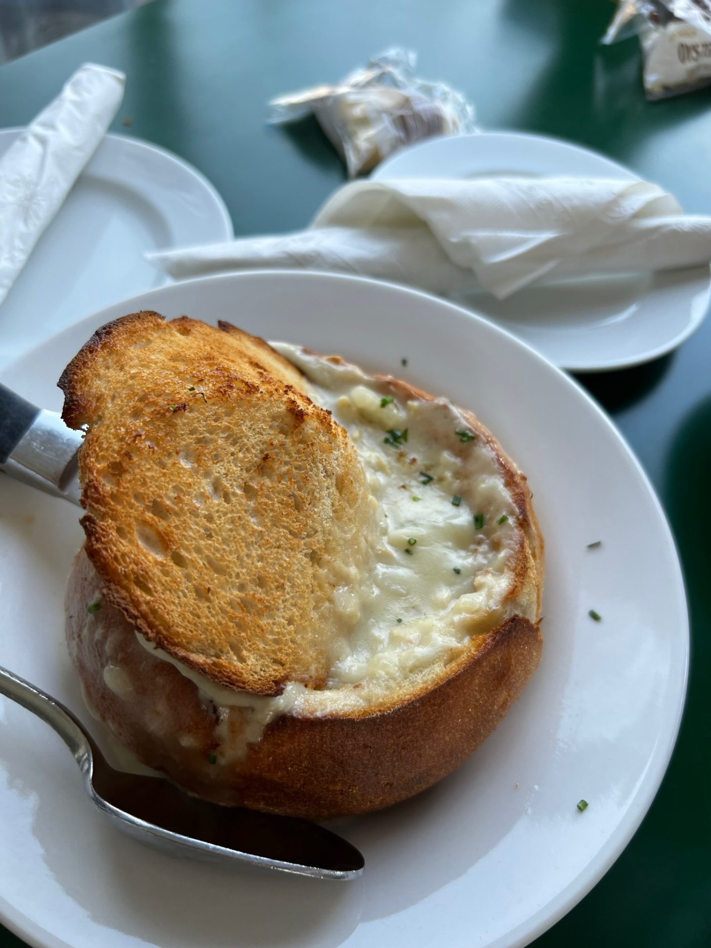 Creamy chowder served in a bread bowl