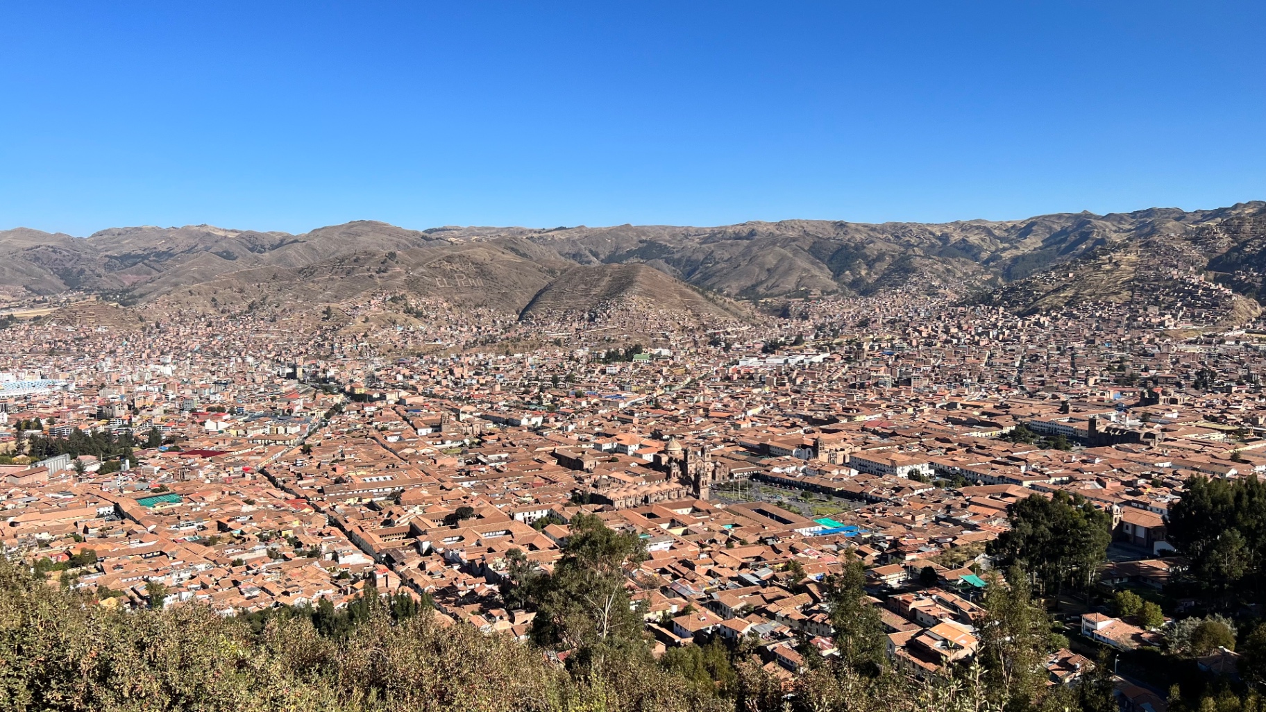 Panoramic view of Cusco and the surrounding dry Andean hills