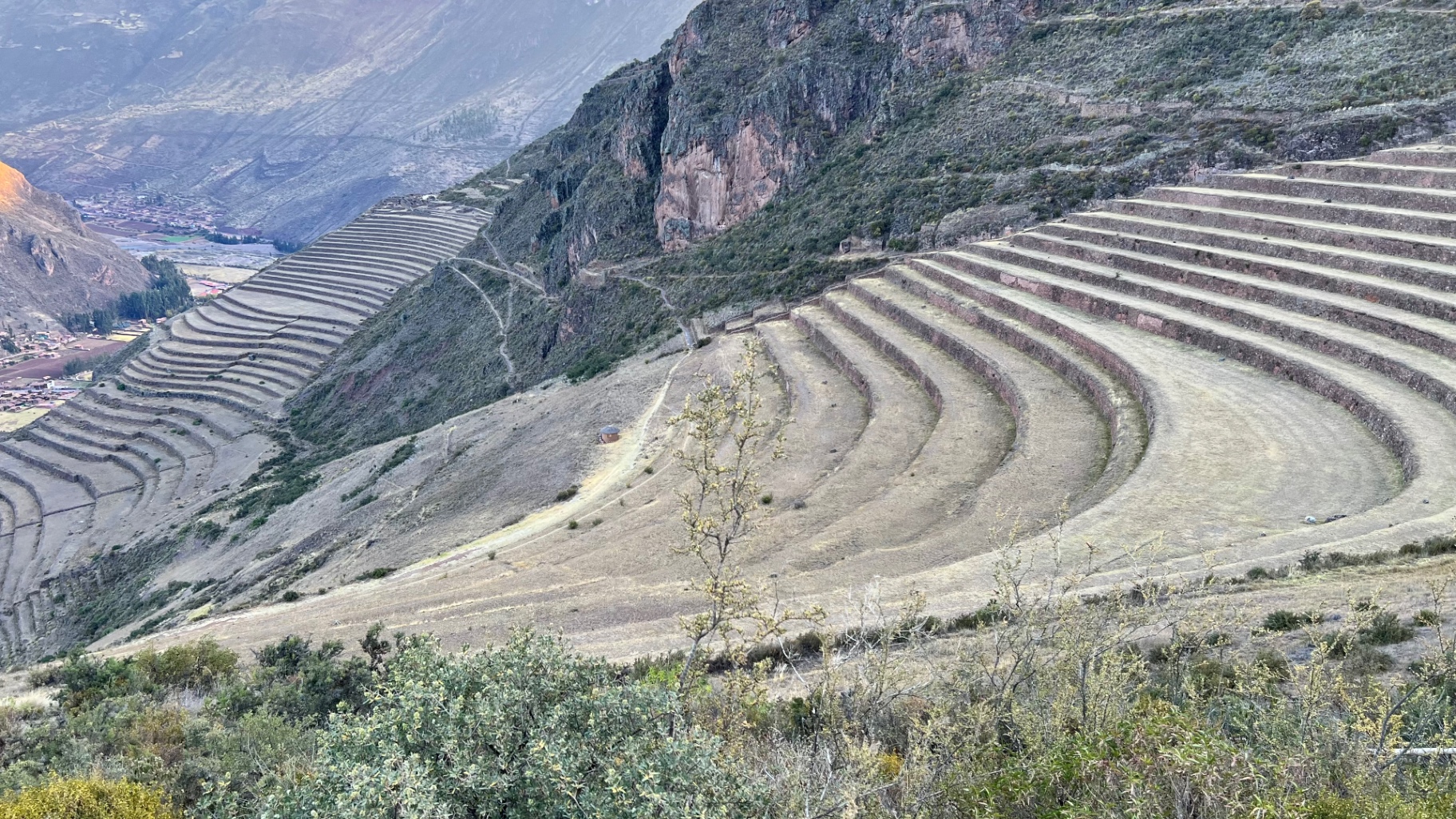 Curving agricultural terraces seen from the road above the Sacred Valley