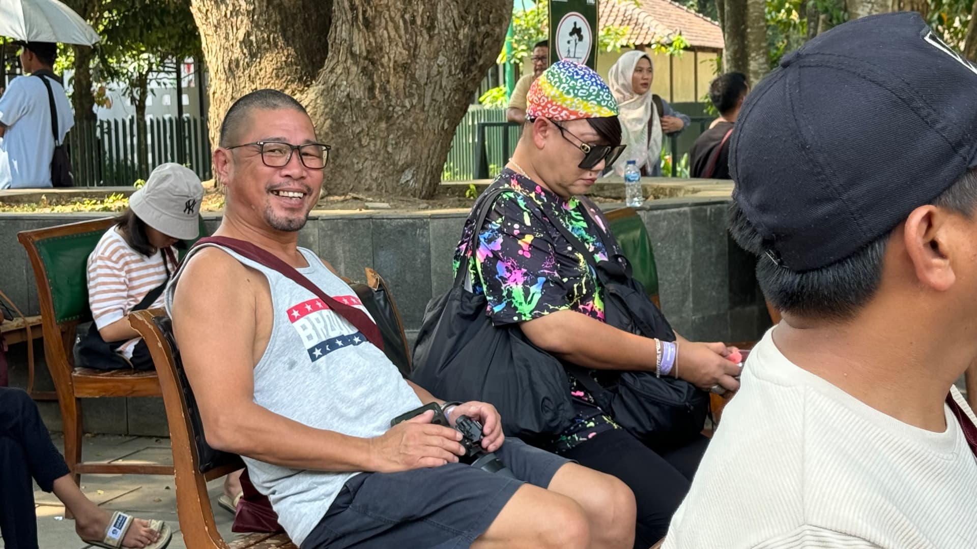 Travel companions resting in the shade near Borobudur