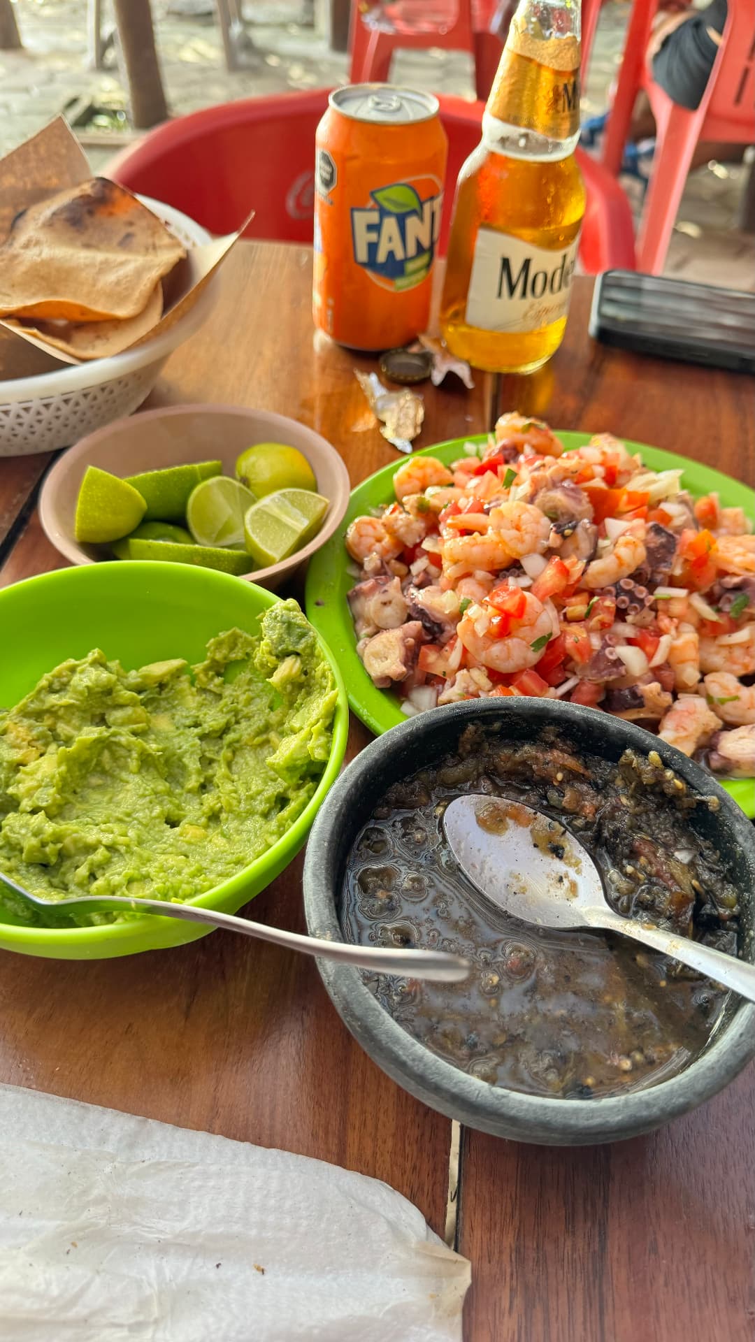 Seafood ceviche, guacamole, salsa, lime, and cold drinks