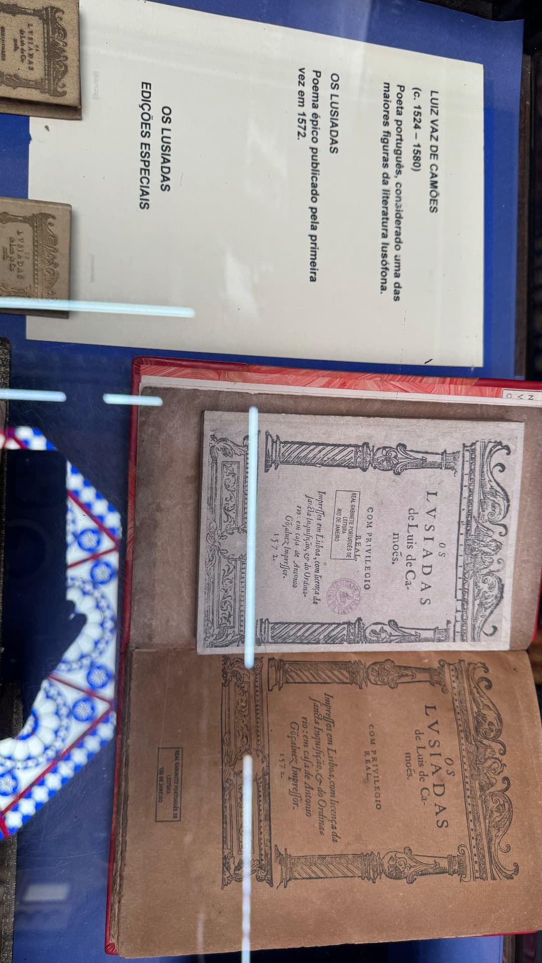 Special editions of Os Lusíadas by Luís de Camões displayed in a case