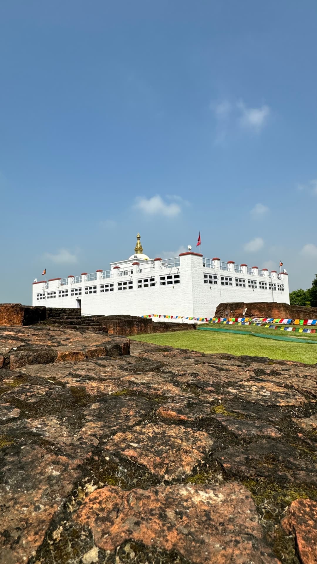 Ancient brick foundations in front of the Maya Devi Temple. — Lumbini, Nepal.