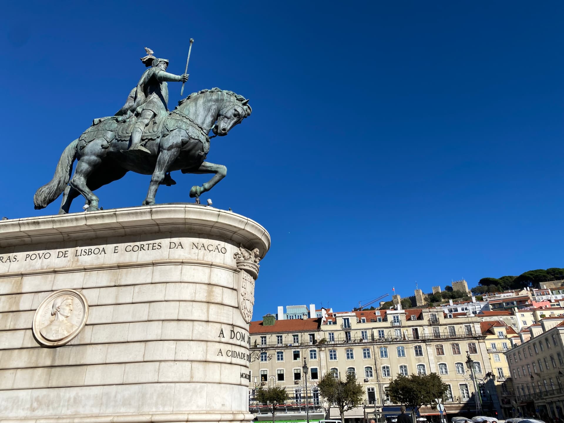 An equestrian statue standing in a Lisbon square